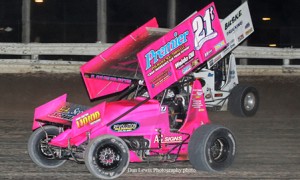 Travis “T.J.” Luedke is racing a pink car in 2013 for breast cancer awareness. (Dan Lewis Photography photo)