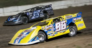R.C. Whitwell (No. 96) of Arizona battles Scott Bloomquist (No. 0) of Mooresburg, Tennessee at the Lucas Oil Dirt Late Model Series event at Oshkosh Speedzone Raceway May 20. The Late Model Whitwell competes in is owned by Mike Wedelstadt.