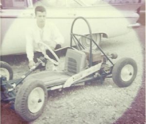 Bob Wondra with the go-kart he built as a youngster using barn stanchions. Submitted photo